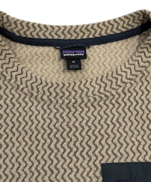 Patagonia（パタゴニア）Patagonia (パタゴニア) R1エア・クルー プルオーバーフリーストップス ベージュ サイズ:SIZE Mの古着・服飾アイテム