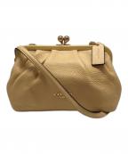 COACHコーチ）の古着「ノラ キスロック クロスボディ ショルダーバッグ」｜イエロー