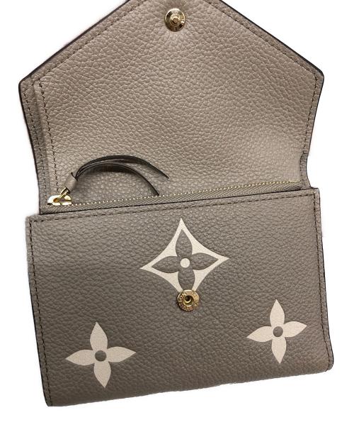 LOUIS VUITTON（ルイ ヴィトン）LOUIS VUITTON (ルイ ヴィトン) ポルトフォイユ・ヴィクトリーヌ ベージュの古着・服飾アイテム