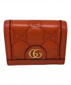 GUCCIグッチ）の古着「GGマトラッセ コンパクト ウォレット」｜オレンジ