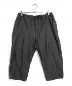 COMOLIコモリ）の古着「ベタシャン テーパードパンツ」｜グレー