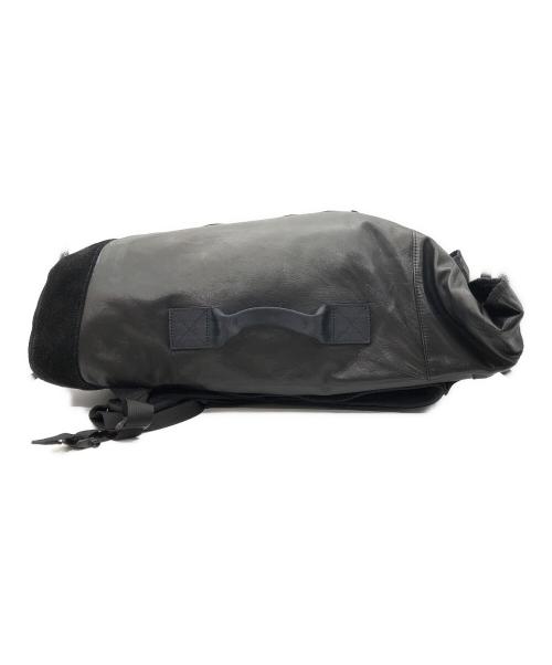 ISAMU KATAYAMA BACKLASH（イサムカタヤマ・バックラッシュ）ISAMU KATAYAMA BACKLASH (イサムカタヤマ・バックラッシュ) RESISTANT (レジスタント) BACK BONE (バックボーン) リュック ブラックの古着・服飾アイテム