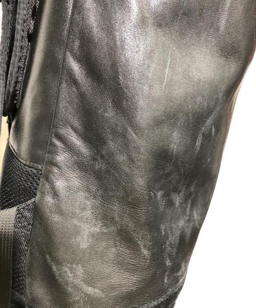 ISAMU KATAYAMA BACKLASH（イサムカタヤマ・バックラッシュ）ISAMU KATAYAMA BACKLASH (イサムカタヤマ・バックラッシュ) RESISTANT (レジスタント) BACK BONE (バックボーン) リュック ブラックの古着・服飾アイテム