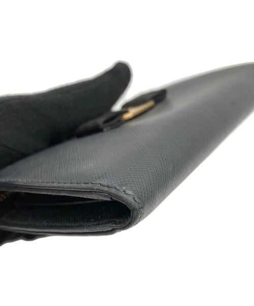 Salvatore Ferragamo（サルヴァトーレ フェラガモ）Salvatore Ferragamo (サルヴァトーレ フェラガモ) リボンL字ジップウォレット ネイビーの古着・服飾アイテム