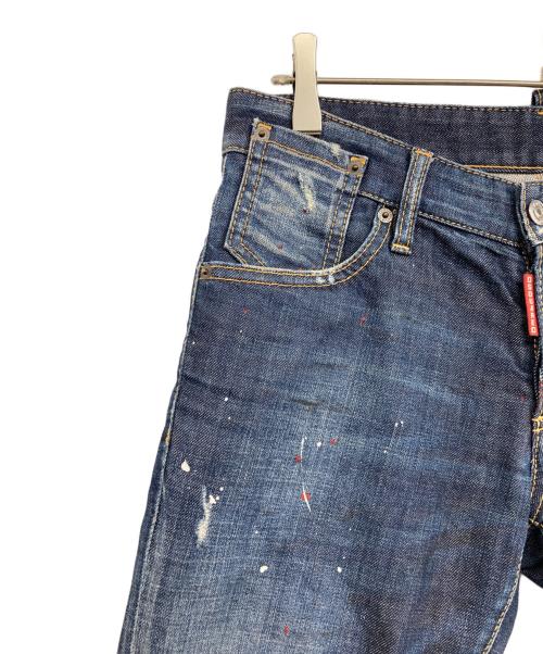 DSQUARED2（ディースクエアード）DSQUARED2 (ディースクエアード) ペイント加工スリムデニムパンツ インディゴ サイズ:44の古着・服飾アイテム