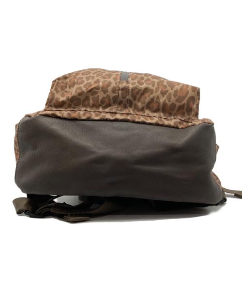 ear PAPILLONNER（イアパピヨネ）ear PAPILLONNER (イアパピヨネ) BURLAP OUTFITTER (バーラップアウトフィッター) ボトムレザーレオパードリュック イエローの古着・服飾アイテム