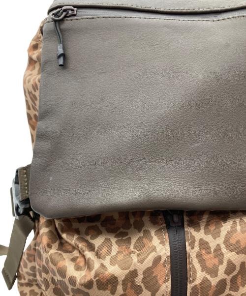 ear PAPILLONNER（イアパピヨネ）ear PAPILLONNER (イアパピヨネ) BURLAP OUTFITTER (バーラップアウトフィッター) ボトムレザーレオパードリュック イエローの古着・服飾アイテム