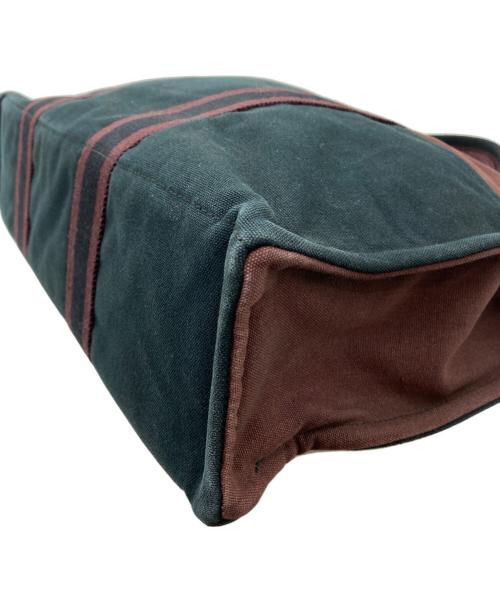 HERMES（エルメス）HERMES (エルメス) バイカラードーヴィルMM ネイビー×ブラウンの古着・服飾アイテム