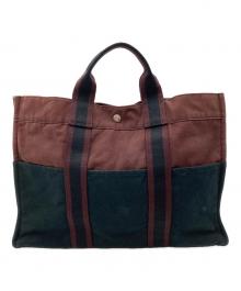 HERMES（エルメス）の古着「バイカラードーヴィルMM」｜ネイビー×ブラウン