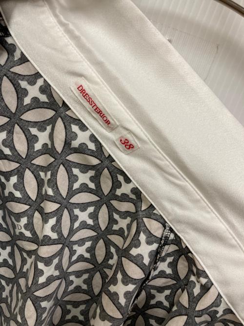 DRESSTERIOR（ドレステリア）DRESSTERIOR (ドレステリア) オーバーラップサークル ブラウス ホワイト サイズ:38の古着・服飾アイテム