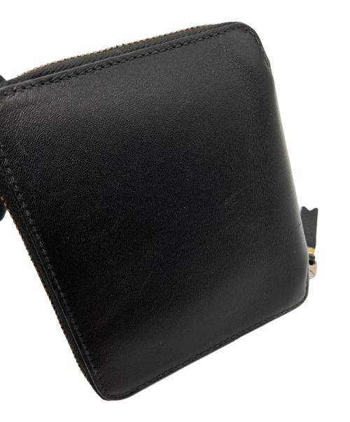 COMME des GARCONS（コムデギャルソン）COMME des GARCONS (コムデギャルソン) ラウンドファスナー財布 ブラックの古着・服飾アイテム
