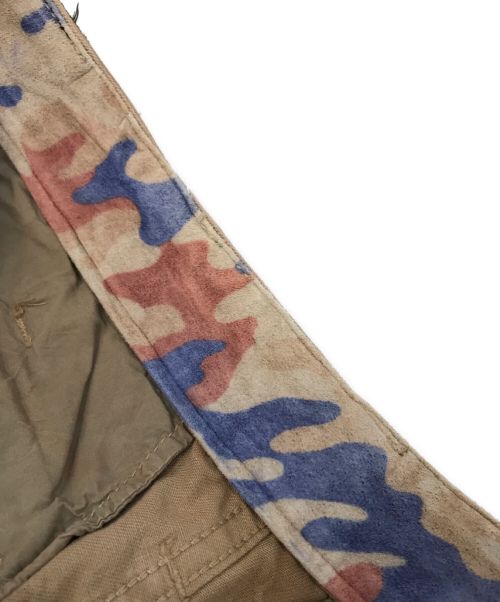 ISAMU KATAYAMA BACKLASH（イサムカタヤマ・バックラッシュ）ISAMU KATAYAMA BACKLASH (イサムカタヤマ・バックラッシュ) 迷彩ペイントハーフカーゴパンツ ブラウン サイズ:Sの古着・服飾アイテム