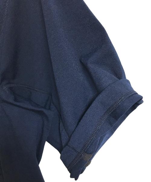 Canterbury（カンタベリー）CANTERBURY nonnative (ノンネイティブ) halfTen TRAINER PULLOVER ハーフテントレイナープルオーバー　ハーフスリーブカットソー　Tシャツ　半袖　スポーツ　日本製　プリントカットソー ネイビーの古着・服飾アイテム