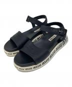 MIU MIUミュウミュウ）の古着「ロゴストラップサンダル　ベルトサンダル」｜ブラック×ホワイト