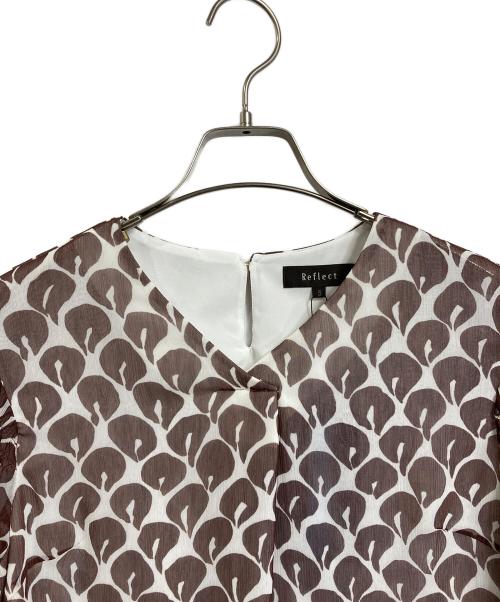 ReFLEcT（リフレクト）ReFLEcT (リフレクト) 涼やかプリントブラウス　総柄ブラウス ブラウン サイズ:5 未使用品の古着・服飾アイテム