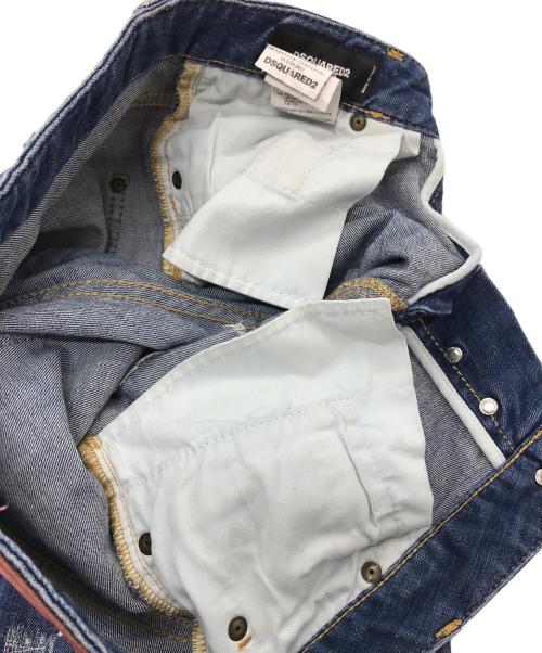 DSQUARED2（ディースクエアード）DSQUARED2 (ディースクエアード) ダメージペンキ加工デニムパンツ COOL GIRL JEAN　ボタンフライ　スキニー　レザーパッチ　ダメージジーンズ　デニムパンツ ブルー サイズ:34の古着・服飾アイテム