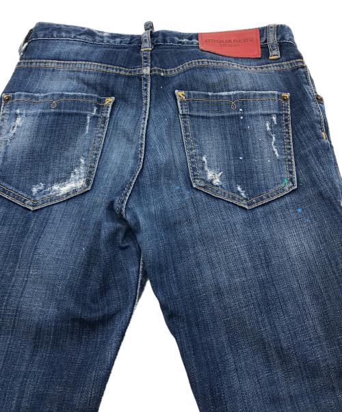 DSQUARED2（ディースクエアード）DSQUARED2 (ディースクエアード) ダメージペンキ加工デニムパンツ COOL GIRL JEAN　ボタンフライ　スキニー　レザーパッチ　ダメージジーンズ　デニムパンツ ブルー サイズ:34の古着・服飾アイテム
