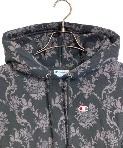 Champion（チャンピオン）Champion (チャンピオン) 総柄プルオーバーパーカー　裏起毛パーカー　目あり　リバースウィーブ　総柄 ブラック サイズ:Sの古着・服飾アイテム