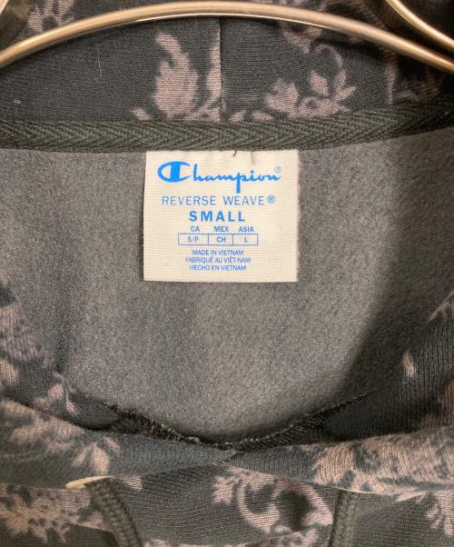 Champion（チャンピオン）Champion (チャンピオン) 総柄プルオーバーパーカー　裏起毛パーカー　目あり　リバースウィーブ　総柄 ブラック サイズ:Sの古着・服飾アイテム