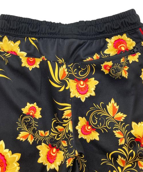 NIKE（ナイキ）NIKE (ナイキ) AS M NSW JGGR PK TRIBUTE AOP ジャガーパンツ トラックパンツ 花柄 ブラック×イエロー サイズ:Sの古着・服飾アイテム