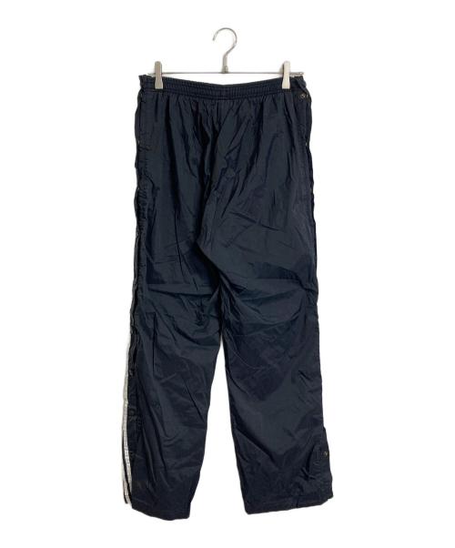adidas（アディダス）adidas (アディダス) 【古着】ナイロンパンツ　ラインパンツ　 万国旗タグ ブラック サイズ:実寸参照の古着・服飾アイテム