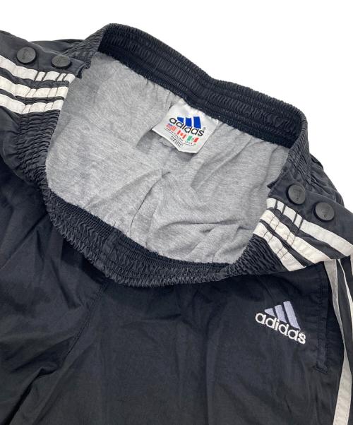 adidas（アディダス）adidas (アディダス) 【古着】ナイロンパンツ　ラインパンツ　 万国旗タグ ブラック サイズ:実寸参照の古着・服飾アイテム