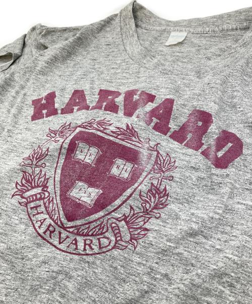 sports wear（スポーツウェア）sports wear (スポーツウェア) 【古着】80’SヴィンテージTシャツ ハーバード大学 染み込み 2段プリント　80年代　カレッジTシャツ　USA製 グレー サイズ:Lの古着・服飾アイテム