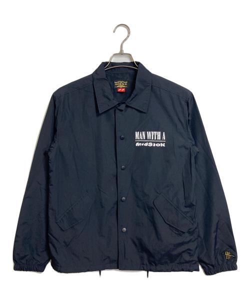 manwithamission（マンウィズアミッション）manwithamission (マンウィズアミッション) スメルスライクイイ肉コーチジャケット　ナイロンジャケット　アウター　 ブラック サイズ:実寸参照の古着・服飾アイテム