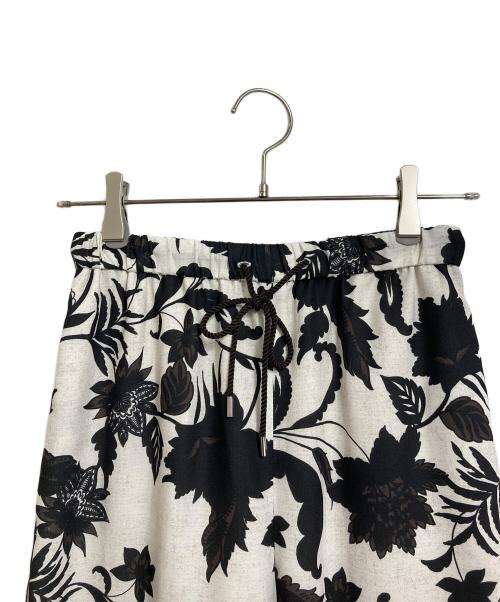 DRESSTERIOR（ドレステリア）DRESSTERIOR (ドレステリア) ボタニカルプリントイージーワイドパンツ　イージーパンツ　ワイドパンツ　花柄 ホワイト×ブラック サイズ:34の古着・服飾アイテム