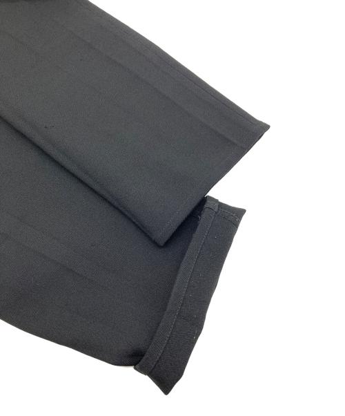COMME des GARCONS HOMME PLUS（コムデギャルソンオムプリュス）COMME des GARCONS HOMME PLUS (コムデギャルソンオムプリュス) タイヤボタンポリ縮絨　パンツ　AD2012 13SS Poor King期 プアキング期 ポリ縮絨 ブラック サイズ:XSの古着・服飾アイテム