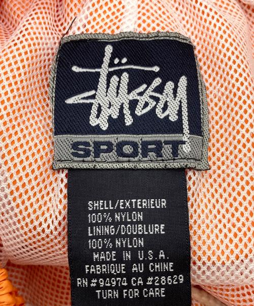 stussy sport（ステューシー スポーツ）stussy sport (ステューシー スポーツ) 【古着】ナイロンパンツ　ラインパンツ　 ジャージ　USA製 old stussy オレンジ サイズ:実寸参照の古着・服飾アイテム