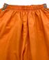 stussy sport (ステューシー スポーツ) 【古着】ナイロンパンツ　ラインパンツ　 ジャージ　USA製 old stussy オレンジ サイズ:実寸参照：7000円