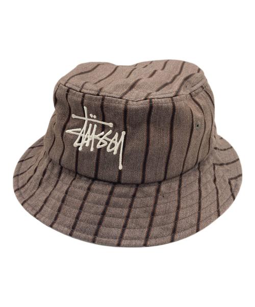 stussy（ステューシー）stussy (ステューシー) ストックロゴバケットハット ベージュ サイズ:Lの古着・服飾アイテム