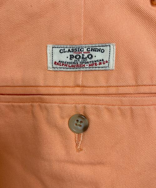 POLO RALPH LAUREN（ポロ・ラルフローレン）POLO RALPH LAUREN (ポロ・ラルフローレン) 【古着】カラーパンツ ポロチノ　チノパン　オレンジ　ポニー無し オレンジ サイズ:W32×L32の古着・服飾アイテム