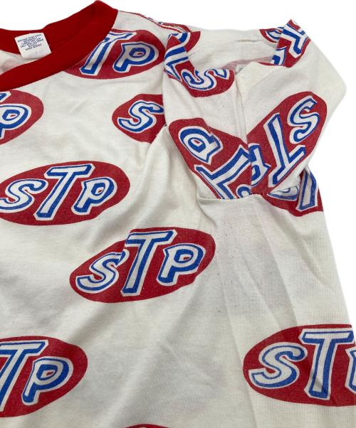 5050（フィフティーフィフティー）5050 (フィフティーフィフティー) STP (エスティーピー) 【古着】70s  リンガーTシャツ　70年代　総柄　アメリカ製　USA製　シングルステッチ レッド×ホワイト サイズ:Mの古着・服飾アイテム
