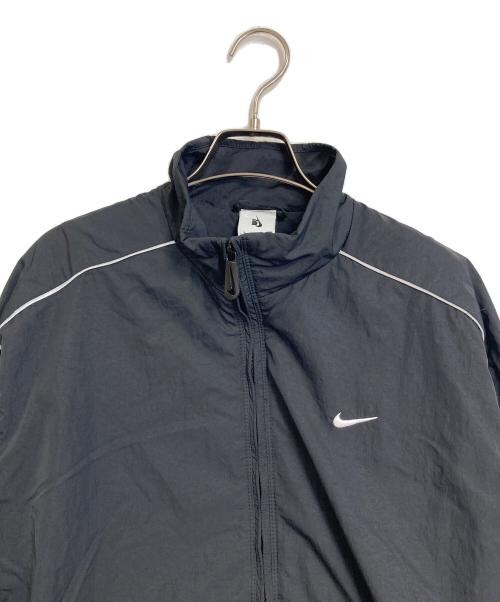 NIKE（ナイキ）NIKE (ナイキ) Solo Swoosh Woven Track Jacket　ナイロンジャケット　トラックジャケット ブラック サイズ:Sの古着・服飾アイテム