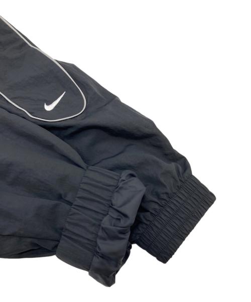NIKE（ナイキ）NIKE (ナイキ) Solo Swoosh Woven Track Jacket　ナイロンジャケット　トラックジャケット ブラック サイズ:Sの古着・服飾アイテム