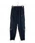 NIKE（ナイキ）の古着「SOLO SWOOSH TRACK PANT トラックパンツ　ナイロンパンツ」｜ブラック
