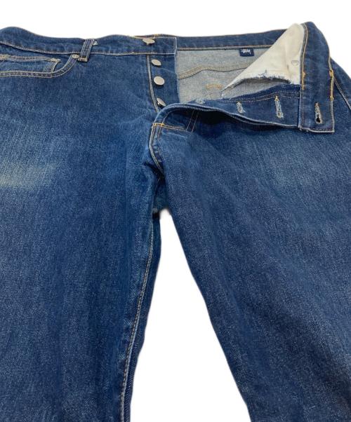 stussy（ステューシー）stussy (ステューシー) ボタンフライデニムパンツ　ジーンズ　USA製 インディゴ サイズ:34Rの古着・服飾アイテム