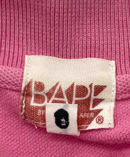 BAPE BY A BATHING APE（ベイプバイアベイシングエイプ）BAPE BY A BATHING APE (ベイプバイアベイシングエイプ) ポロシャツ　半袖シャツ　日本製 ピンク サイズ:Mの古着・服飾アイテム