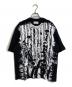 TAAKK（ターク）の古着「RUFFLE PRINT T-SHIRTS ペイント加工フリルＴシャツ　コットンTシャツ」｜ブラック×ホワイト
