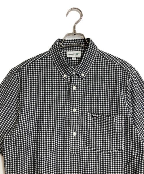 LACOSTE（ラコステ）LACOSTE (ラコステ) クールマックスブレンドジャガード半袖ポロシャツ　ギンガム ブラック×ホワイト サイズ:Mの古着・服飾アイテム