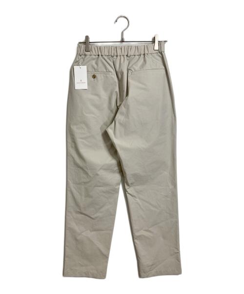UNITED ARROWS（ユナイテッドアローズ）UNITED ARROWS (ユナイテッドアローズ) タイプライターハーフギャザーテーパード1プリーツパンツ アイボリー サイズ:S 未使用品の古着・服飾アイテム