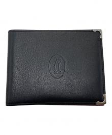 Cartier（カルティエ）の古着「カボション 二つ折り財布　ウォレット　札入れ　コンパクト　」｜ブラック