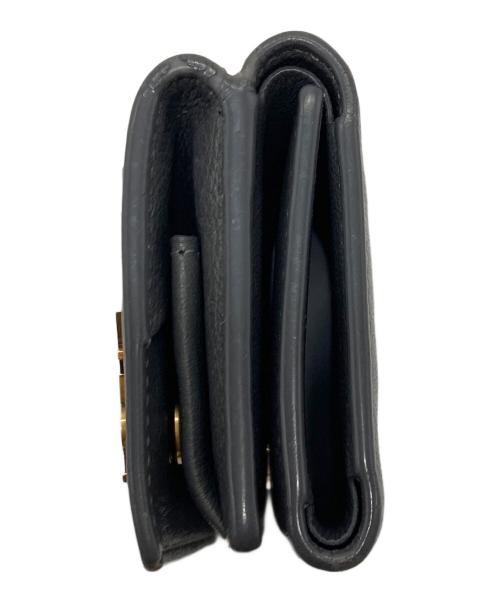 Yves Saint Laurent（イヴサンローラン）Yves Saint Laurent (イヴサンローラン) オリガミ タイニー 三つ折り財布　ミニ財布 グレー サイズ:実寸参照の古着・服飾アイテム