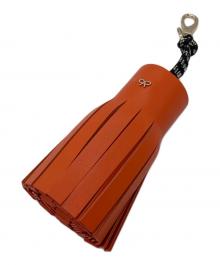 ANYA HINDMARCH（アニヤ・ハインドマーチ）の古着「レザータッセルチャーム」｜オレンジ