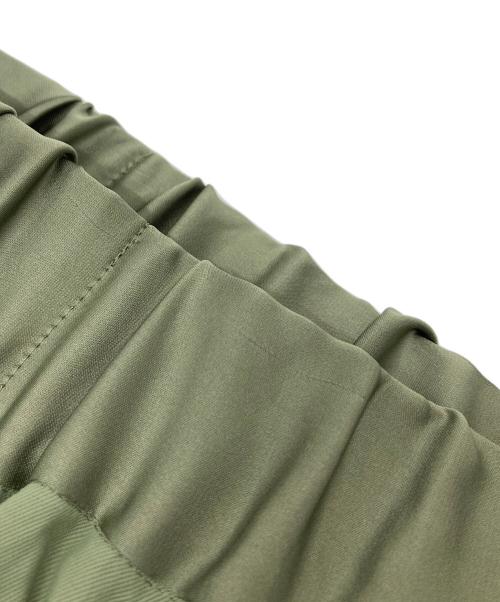 OLLEBOREBLA（アルベロベロ）OLLEBOREBLA (アルベロベロ) ブタさんSMILEパンツ　薄手　個性的　異素材　ドッキング グリーン サイズ:実寸参照の古着・服飾アイテム