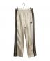 Needles（ニードルズ）の古着「トラックパンツ　ジャージ　サイドラインパンツ　日本製」｜アイボリー×ブラウン