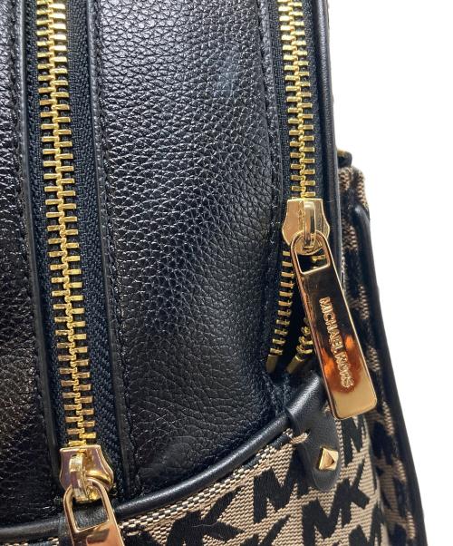 MICHAEL KORS（マイケル・コース）MICHAEL KORS  (マイケル・コース) リュック　MK ロゴバッグ　総柄 ブラック×ブラウン サイズ:実寸参照の古着・服飾アイテム