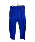 LACOSTEラコステ）の古着「テックプリントトラックパンツ　ナイロン混パンツ」｜ブルー